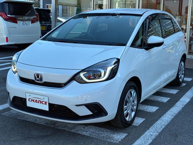 フィット e:HEVホーム 衝突軽減 レーンアシスト 純正ナビ CD DVD MSV Bluetooth接続 バックカメラ スマートキー ETC コーナーセンサー アダプティブクルコン LED オートハイビーム オートライト(57枚目)