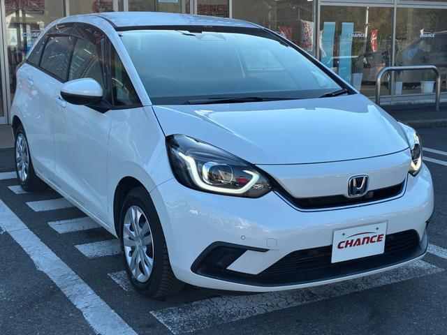 フィット e:HEVホーム 衝突軽減 レーンアシスト 純正ナビ CD DVD MSV Bluetooth接続 バックカメラ スマートキー ETC コーナーセンサー アダプティブクルコン LED オートハイビーム オートライト(59枚目)