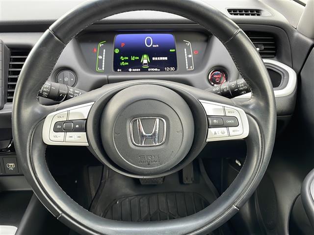 フィット ｅ：ＨＥＶホーム　純正９インチナビ　フルセグ　ＤＶＤ　Ｂｌｕｅｔｏｏｔｈ　前後ドラレコ　ＥＴＣ　Ｂカメ　ＡＣＣ　前後コーナーセンサー　レーンアシスト　ＣＭＢＳ　スマートキー　プッシュスタート　純正ＬＥＤヘッドライト（2枚目）