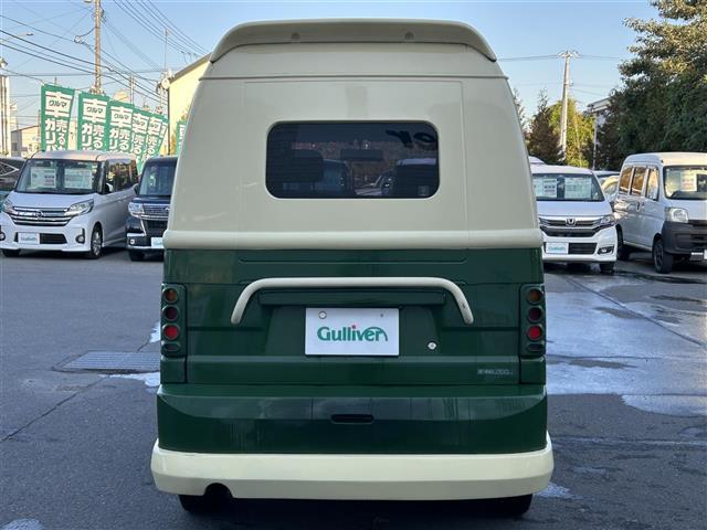 ドミンゴ アラジン ☆ワーゲンバス仕様☆ベッドキット☆ポータブルシンク☆100Vコンパクトインバーター☆社外ポータブルメモリナビ☆ワンセグTV☆社外CD/MDチューナー(3枚目)