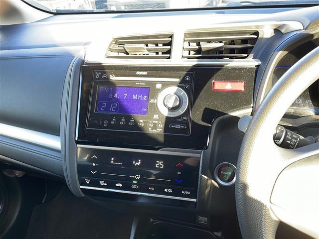 フィットハイブリッド Ｆパッケージ　４ＷＤ　純正オーディオ　ＣＤ／ラジオ／ＵＳＢ／ＡＵＸ　ワイパーデアイザー　ＬＥＤヘッドライト　ミラーヒーター　ＥＴＣ　フロアマット　ドアバイザー（21枚目）