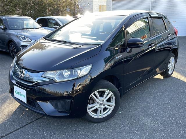 フィットハイブリッド Ｆパッケージ　４ＷＤ　純正オーディオ　ＣＤ／ラジオ／ＵＳＢ／ＡＵＸ　ワイパーデアイザー　ＬＥＤヘッドライト　ミラーヒーター　ＥＴＣ　フロアマット　ドアバイザー（34枚目）