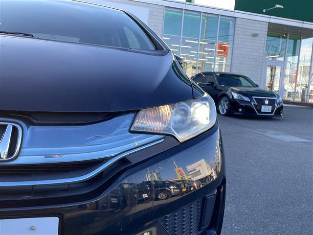 フィットハイブリッド Ｆパッケージ　４ＷＤ　純正オーディオ　ＣＤ／ラジオ／ＵＳＢ／ＡＵＸ　ワイパーデアイザー　ＬＥＤヘッドライト　ミラーヒーター　ＥＴＣ　フロアマット　ドアバイザー（40枚目）