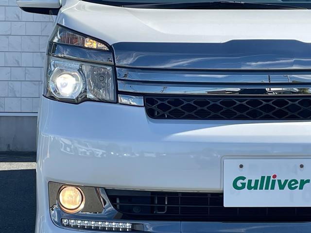 ヴォクシー 　ワンオーナー　Ｇ’ｓ　純正ＳＤメモリーナビ　バックカメラ　フルセグＴＶ　ＣＤ／ＤＶＤ　ＥＴＣ　Ｂｌｕｅｔｏｏｔｈ　両側パワースライドドア　純正フロアマット　社外製１８インチアルミホイール（45枚目）