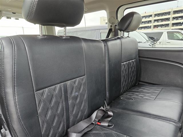 NV350キャラバンバン プレミアムGXロングブラックギア 禁煙車 アラウンドビューモニタ ドラレコ エマージェンシーブレーキ LEDオートライト 社外ナビ フルセグ 片側パワースライドドア 後席用モニタ スマートキー エンジンスイッチ 純正15インチAW(10枚目)