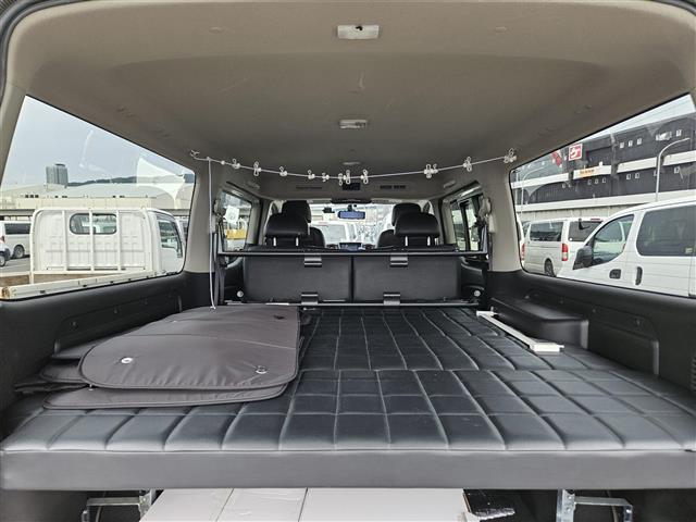 NV350キャラバンバン プレミアムGXロングブラックギア 禁煙車 アラウンドビューモニタ ドラレコ エマージェンシーブレーキ LEDオートライト 社外ナビ フルセグ 片側パワースライドドア 後席用モニタ スマートキー エンジンスイッチ 純正15インチAW(11枚目)