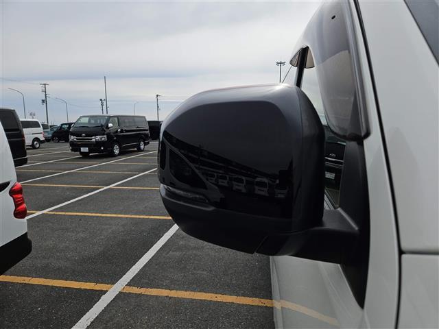 NV350キャラバンバン プレミアムGXロングブラックギア 禁煙車 アラウンドビューモニタ ドラレコ エマージェンシーブレーキ LEDオートライト 社外ナビ フルセグ 片側パワースライドドア 後席用モニタ スマートキー エンジンスイッチ 純正15インチAW(32枚目)