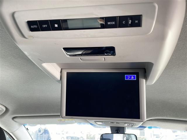 ＭＰＶ ２３Ｓ　社外ナビ／フルセグＴＶ／ＦＭ／ＡＭ／Ｂｔ／ＤＶＤ／Ｂカメラ／両側パワースライドドア／純正フリップダウンモニター／電動格納ミラー／オットマ／ウォークスルー／純正ＡＷラジアルタイヤ４本積載／ＴＣＳ（6枚目）