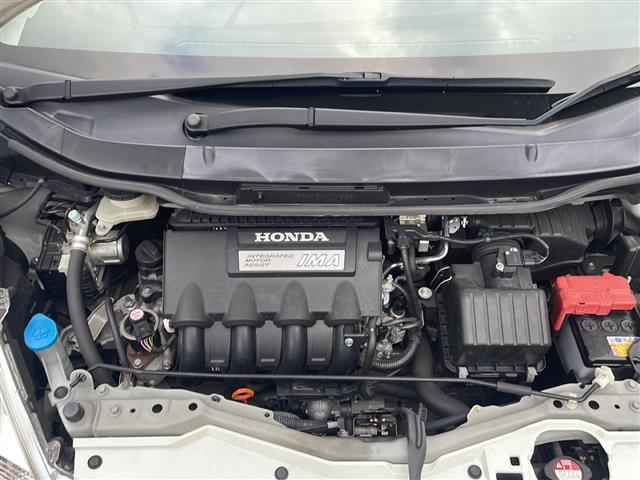 フィットハイブリッド ハイブリッド・10thアニバーサリー HDDナビ フルセグTV MSV DVD CD SD Bluetooth ETC クルーズコントロール スマートキー スペアキー フロアマット ドアバイザー ライトレベライザー 新車保証書 取扱説明書(31枚目)