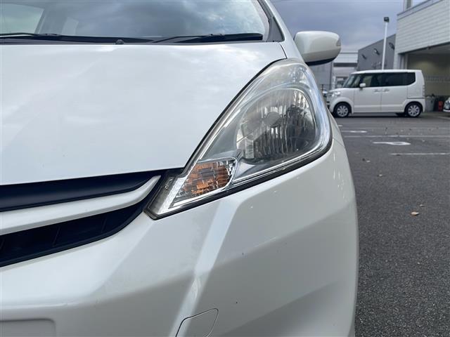 フィットハイブリッド ハイブリッド・10thアニバーサリー HDDナビ フルセグTV MSV DVD CD SD Bluetooth ETC クルーズコントロール スマートキー スペアキー フロアマット ドアバイザー ライトレベライザー 新車保証書 取扱説明書(33枚目)