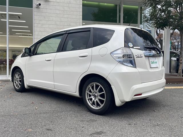 フィットハイブリッド ハイブリッド・10thアニバーサリー HDDナビ フルセグTV MSV DVD CD SD Bluetooth ETC クルーズコントロール スマートキー スペアキー フロアマット ドアバイザー ライトレベライザー 新車保証書 取扱説明書(43枚目)