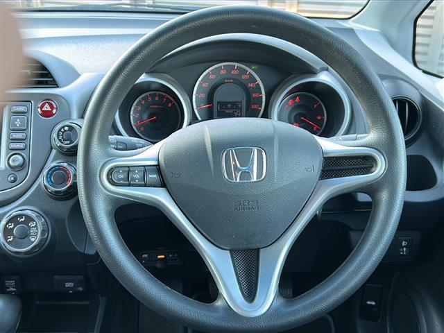 フィット G スマートスタイルエディション ワンオーナー 純正HDDナビ バックカメラ DVD再生 MP3 CD再生 ワンセグテレビ、走行中視聴可能 HDD録音機能 AM/FMラジオ ビルトインETC 取扱説明書 保証書(4枚目)