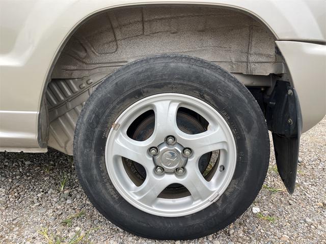 パジェロミニ ＶＲ　ＨＩＤヘッドライト　Ｃａｒｒｏｚｚｅｒｉａスピーカー　４ＷＤ　メンテナンスノート　取説　スペアキー　キーレスエントリー　ＭＴ　ＡＢＳ　カセット　アルミホイール　衝突安全ボディ　パワーステアリング（26枚目）