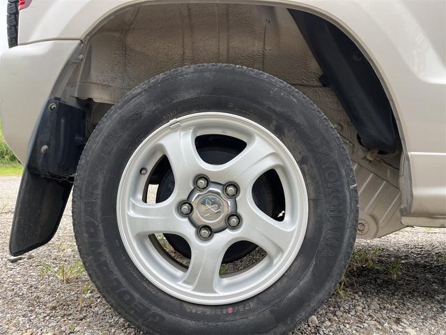 パジェロミニ ＶＲ　ＨＩＤヘッドライト　Ｃａｒｒｏｚｚｅｒｉａスピーカー　４ＷＤ　メンテナンスノート　取説　スペアキー　キーレスエントリー　ＭＴ　ＡＢＳ　カセット　アルミホイール　衝突安全ボディ　パワーステアリング（29枚目）