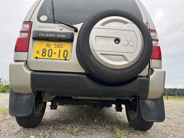パジェロミニ ＶＲ　ＨＩＤヘッドライト　Ｃａｒｒｏｚｚｅｒｉａスピーカー　４ＷＤ　メンテナンスノート　取説　スペアキー　キーレスエントリー　ＭＴ　ＡＢＳ　カセット　アルミホイール　衝突安全ボディ　パワーステアリング（30枚目）