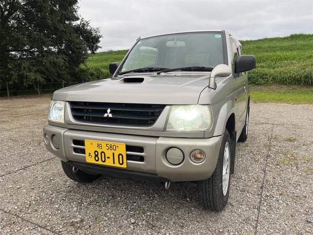 パジェロミニ ＶＲ　ＨＩＤヘッドライト　Ｃａｒｒｏｚｚｅｒｉａスピーカー　４ＷＤ　メンテナンスノート　取説　スペアキー　キーレスエントリー　ＭＴ　ＡＢＳ　カセット　アルミホイール　衝突安全ボディ　パワーステアリング（33枚目）