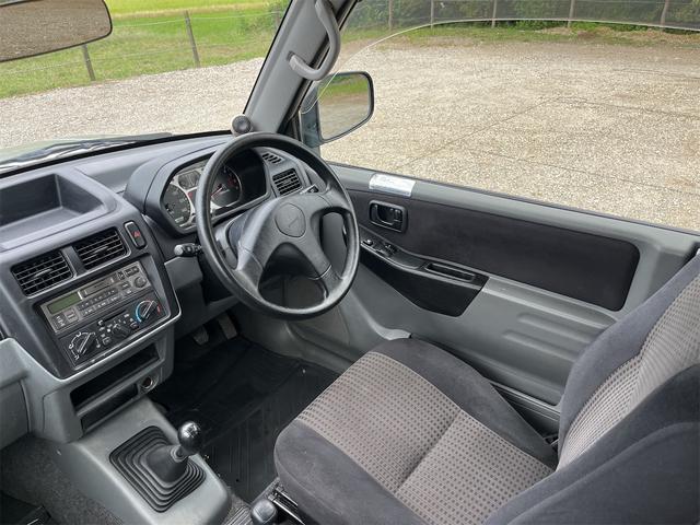 パジェロミニ ＶＲ　ＨＩＤヘッドライト　Ｃａｒｒｏｚｚｅｒｉａスピーカー　４ＷＤ　メンテナンスノート　取説　スペアキー　キーレスエントリー　ＭＴ　ＡＢＳ　カセット　アルミホイール　衝突安全ボディ　パワーステアリング（46枚目）