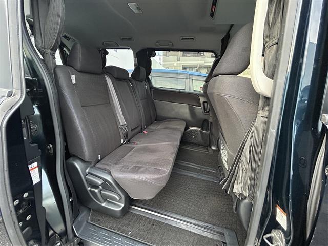 ヴォクシー V ◇純正SDナビ◇フルセグTV◇バックカメラ◇クルーズコントロール追従機能無◇ビルトインETC◇両側パワースライドドア◇DVD再生機能付き◇自動防眩ミラー◇後席ロールサンシェード◇純正15インチAW(32枚目)