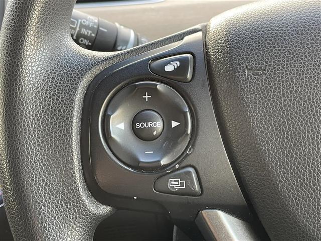 フリードハイブリッド ハイブリッド・Ｇホンダセンシング　◇純正インターナビ◇バックカメラ◇衝突軽減ブレーキ◇アダプティブクルーズコントロール◇車線維持支援システム◇車線逸脱警報◇車両接近通報装置◇両側パワースライドドア◇ＥＴＣ◇ＤＶＤ再生可◇３列シート（4枚目）