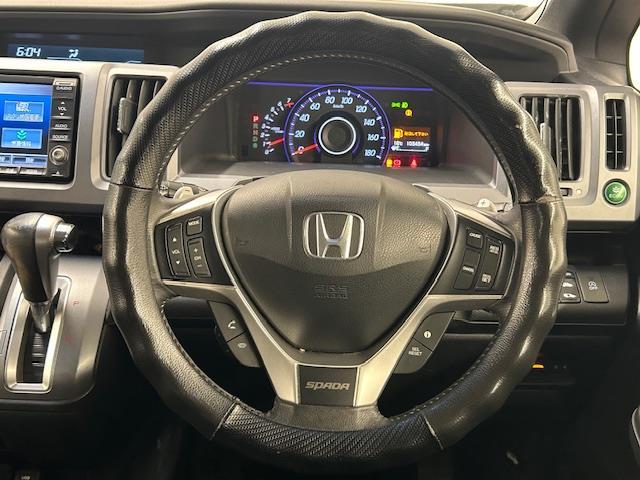 ステップワゴンスパーダ Ｚ　クールスピリット　純正ＨＤＤナビ　フルセグテレビ　バックカメラ　フリップダウンモニター　クルーズコントロール　両側パワースライドドア　ＨＩＤ　オートライト　ＥＴＣ　電動格納ミラー　アイドリングストップ（7枚目）