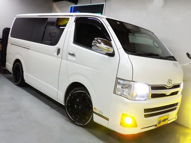 ハイエースバン ロングスーパーGL 社外エアロ 社外16インチAW ルーフスポイラーカバー ローダウン 社外SDナビ バックカメラ 両側スライドドア ETC 地デジ キーレス ドアバイザー(18枚目)