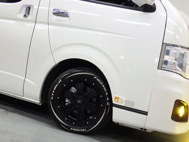 ハイエースバン ロングスーパーGL 社外エアロ 社外16インチAW ルーフスポイラーカバー ローダウン 社外SDナビ バックカメラ 両側スライドドア ETC 地デジ キーレス ドアバイザー(19枚目)