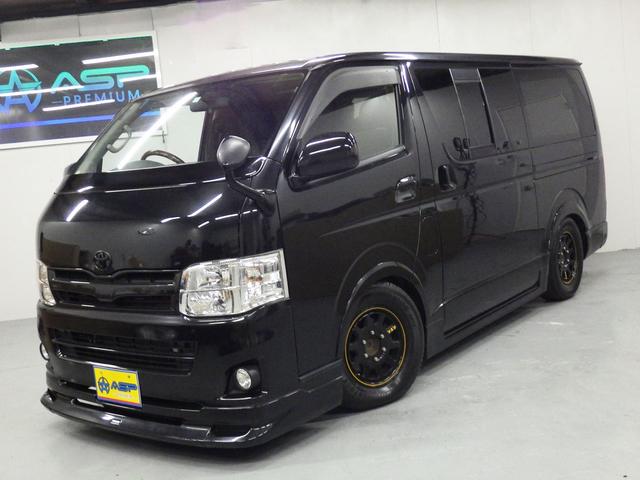 ハイエースバン ロングスーパーＧＬ　ワンオーナー　モデリスタエアロ　社外１５インチＡＷ　社外ＳＤナビ　バックカメラ　ＥＴＣ　ウッドコンビハンドル　ベッドキット　フェンダーカバー　ボンネットスポイラー　サイドエアロ　ローダウン（2枚目）