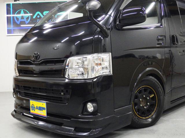 ハイエースバン ロングスーパーＧＬ　ワンオーナー　モデリスタエアロ　社外１５インチＡＷ　社外ＳＤナビ　バックカメラ　ＥＴＣ　ウッドコンビハンドル　ベッドキット　フェンダーカバー　ボンネットスポイラー　サイドエアロ　ローダウン（3枚目）