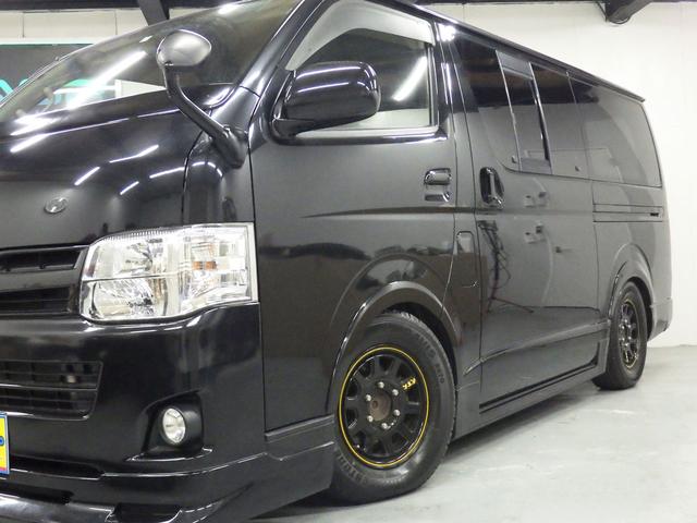 ハイエースバン ロングスーパーＧＬ　ワンオーナー　モデリスタエアロ　社外１５インチＡＷ　社外ＳＤナビ　バックカメラ　ＥＴＣ　ウッドコンビハンドル　ベッドキット　フェンダーカバー　ボンネットスポイラー　サイドエアロ　ローダウン（5枚目）