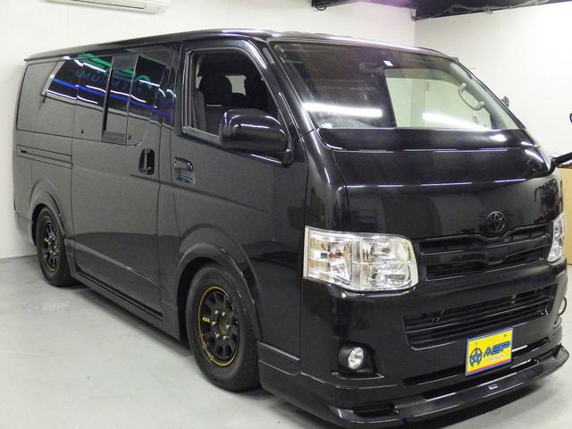 ハイエースバン ロングスーパーＧＬ　ワンオーナー　モデリスタエアロ　社外１５インチＡＷ　社外ＳＤナビ　バックカメラ　ＥＴＣ　ウッドコンビハンドル　ベッドキット　フェンダーカバー　ボンネットスポイラー　サイドエアロ　ローダウン（8枚目）