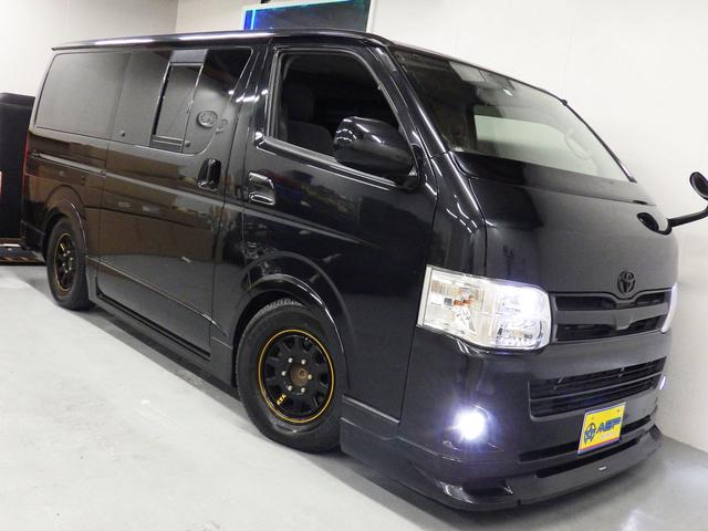 ハイエースバン ロングスーパーＧＬ　ワンオーナー　モデリスタエアロ　社外１５インチＡＷ　社外ＳＤナビ　バックカメラ　ＥＴＣ　ウッドコンビハンドル　ベッドキット　フェンダーカバー　ボンネットスポイラー　サイドエアロ　ローダウン（11枚目）