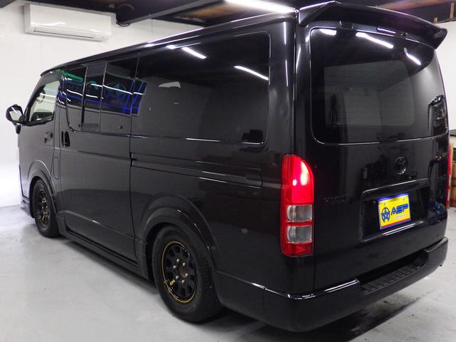 ハイエースバン ロングスーパーＧＬ　ワンオーナー　モデリスタエアロ　社外１５インチＡＷ　社外ＳＤナビ　バックカメラ　ＥＴＣ　ウッドコンビハンドル　ベッドキット　フェンダーカバー　ボンネットスポイラー　サイドエアロ　ローダウン（15枚目）