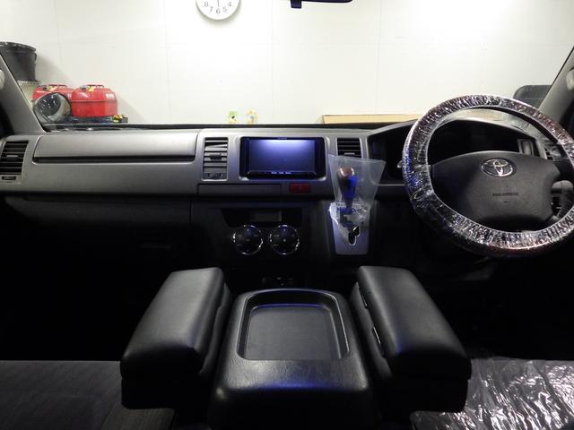 ハイエースバン ロングスーパーＧＬ　ワンオーナー　モデリスタエアロ　社外１５インチＡＷ　社外ＳＤナビ　バックカメラ　ＥＴＣ　ウッドコンビハンドル　ベッドキット　フェンダーカバー　ボンネットスポイラー　サイドエアロ　ローダウン（22枚目）