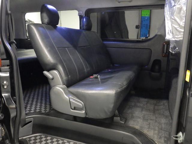 ハイエースバン ロングスーパーＧＬ　ワンオーナー　モデリスタエアロ　社外１５インチＡＷ　社外ＳＤナビ　バックカメラ　ＥＴＣ　ウッドコンビハンドル　ベッドキット　フェンダーカバー　ボンネットスポイラー　サイドエアロ　ローダウン（24枚目）