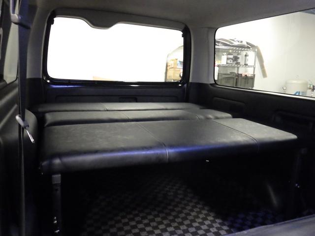 ハイエースバン ロングスーパーＧＬ　ワンオーナー　モデリスタエアロ　社外１５インチＡＷ　社外ＳＤナビ　バックカメラ　ＥＴＣ　ウッドコンビハンドル　ベッドキット　フェンダーカバー　ボンネットスポイラー　サイドエアロ　ローダウン（25枚目）
