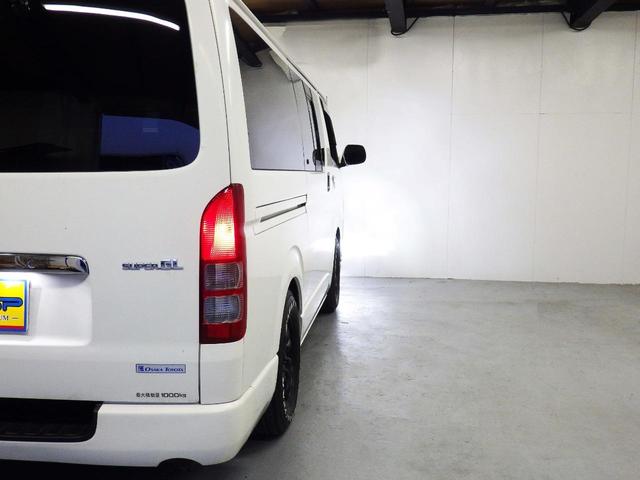 ハイエースバン ロングスーパーGL アルパインHDDナビ バックカメラ ETC HID 地デジ フリップダウンモニター 両側スライドドア 高さ調整リクライニングベッドキット ドアバイザー 社外16インチAW ローダウン(23枚目)