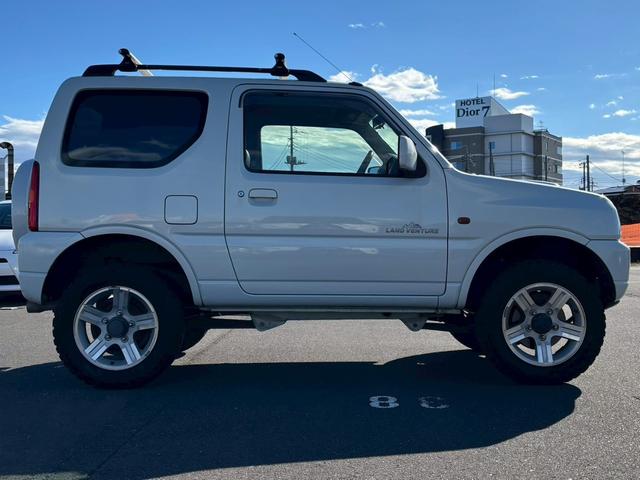 ジムニー ランドベンチャー ランドベンチャー・4WD・オートマ・ETC・社外ナビ・ワンセグTV・マニュアルエアコン・電動格納ミラー・キーレス・ルーフラック・ハーフレザー(12枚目)