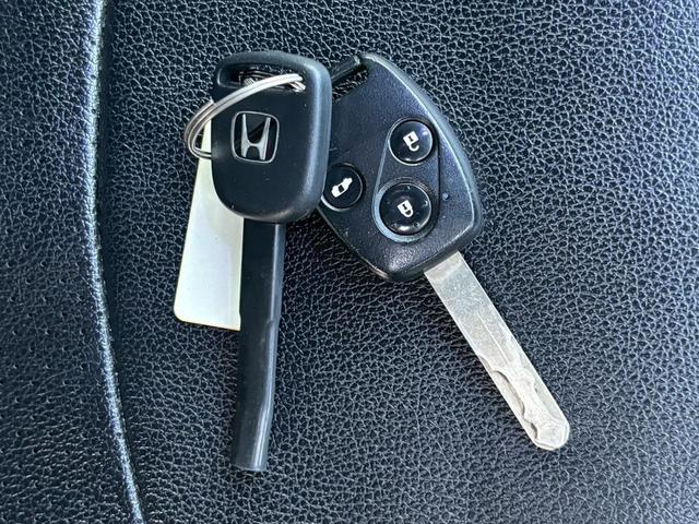 ステップワゴンスパーダ S スパーダS 車検令和9年4月・社外ナビ・エアロ・純正17インチアルミ・左側パワースライドドア・バックカメラ・テレビ・フリップダウンモニター・オートエアコン・ETC・電動格納ミラー・シートカバー(50枚目)