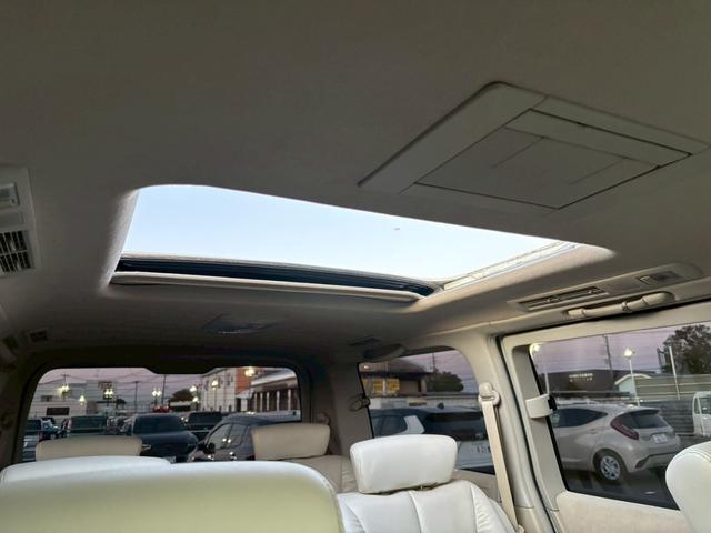 エルグランド ライダー 車検令和9年8月・ワンオーナー・4WD・サンルーフ・白本革・両側パワースライドドア・バックカメラ・社外18インチアルミホイール・オートエアコン(40枚目)