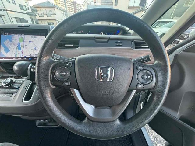 フリード G 4WD ETC バックカメラ ナビ TV オートクルーズコントロール レーンアシスト 衝突被害軽減システム 両側電動スライドドア オートライト スマートキー アイドリングストップ 電動格納ミラー(3枚目)