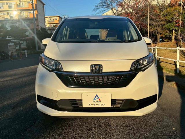 フリード G 4WD ETC バックカメラ ナビ TV オートクルーズコントロール レーンアシスト 衝突被害軽減システム 両側電動スライドドア オートライト スマートキー アイドリングストップ 電動格納ミラー(14枚目)