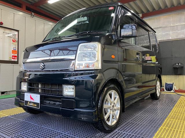 エブリイワゴン ＰＺターボスペシャル　ハイルーフ　両側電動スライドドア　オートステップ　ナビフルセグＴＶ　Ｂカメラ　Ｂｌｕｅｔｏｏｔｈ　ＥＴＣ　シートカバー　キーレス　オートＡＣ　社外ピアノブラックパネル　ウッドハンドル　ＨＩＤライト（6枚目）