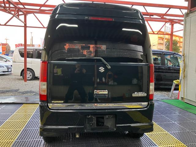 エブリイワゴン ＰＺターボスペシャル　ハイルーフ　両側電動スライドドア　オートステップ　ナビフルセグＴＶ　Ｂカメラ　Ｂｌｕｅｔｏｏｔｈ　ＥＴＣ　シートカバー　キーレス　オートＡＣ　社外ピアノブラックパネル　ウッドハンドル　ＨＩＤライト（8枚目）