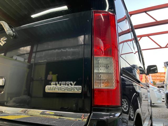 エブリイワゴン ＰＺターボスペシャル　ハイルーフ　両側電動スライドドア　オートステップ　ナビフルセグＴＶ　Ｂカメラ　Ｂｌｕｅｔｏｏｔｈ　ＥＴＣ　シートカバー　キーレス　オートＡＣ　社外ピアノブラックパネル　ウッドハンドル　ＨＩＤライト（9枚目）