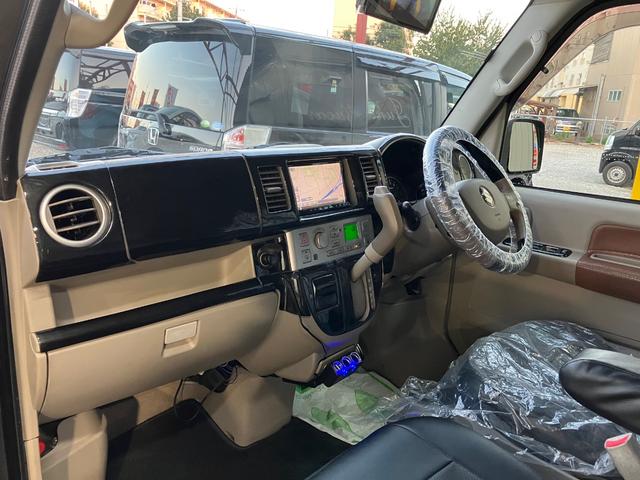 エブリイワゴン ＰＺターボスペシャル　ハイルーフ　両側電動スライドドア　オートステップ　ナビフルセグＴＶ　Ｂカメラ　Ｂｌｕｅｔｏｏｔｈ　ＥＴＣ　シートカバー　キーレス　オートＡＣ　社外ピアノブラックパネル　ウッドハンドル　ＨＩＤライト（16枚目）