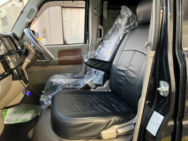 エブリイワゴン ＰＺターボスペシャル　ハイルーフ　両側電動スライドドア　オートステップ　ナビフルセグＴＶ　Ｂカメラ　Ｂｌｕｅｔｏｏｔｈ　ＥＴＣ　シートカバー　キーレス　オートＡＣ　社外ピアノブラックパネル　ウッドハンドル　ＨＩＤライト（35枚目）