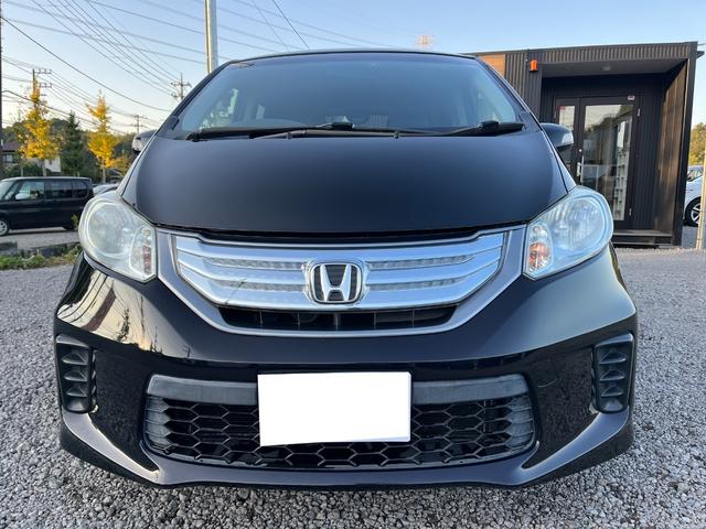 フリードハイブリッド ジャストセレクション ETC バックカメラ TV オートクルーズコントロール 両側スライド・片側電動 HID スマートキー 電動格納ミラー 3列シート CVT CD DVD再生 Bluetooth 盗難防止システム ABS(12枚目)