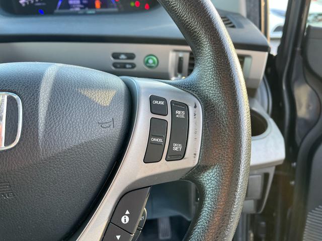 フリードハイブリッド ジャストセレクション ETC バックカメラ TV オートクルーズコントロール 両側スライド・片側電動 HID スマートキー 電動格納ミラー 3列シート CVT CD DVD再生 Bluetooth 盗難防止システム ABS(30枚目)