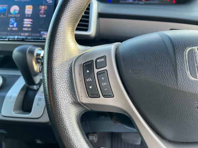 フリードハイブリッド ジャストセレクション ETC バックカメラ TV オートクルーズコントロール 両側スライド・片側電動 HID スマートキー 電動格納ミラー 3列シート CVT CD DVD再生 Bluetooth 盗難防止システム ABS(31枚目)