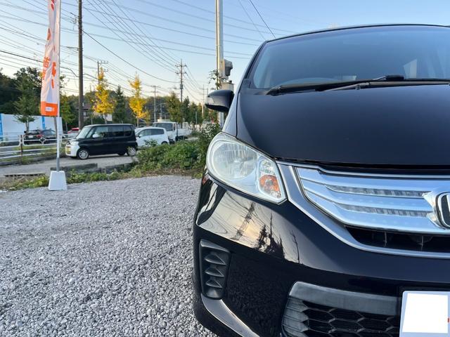 フリードハイブリッド ジャストセレクション ETC バックカメラ TV オートクルーズコントロール 両側スライド・片側電動 HID スマートキー 電動格納ミラー 3列シート CVT CD DVD再生 Bluetooth 盗難防止システム ABS(35枚目)